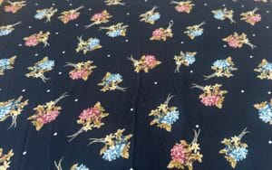 Floral Viscose - Black with white polka dots and flower print. 2.5m length.